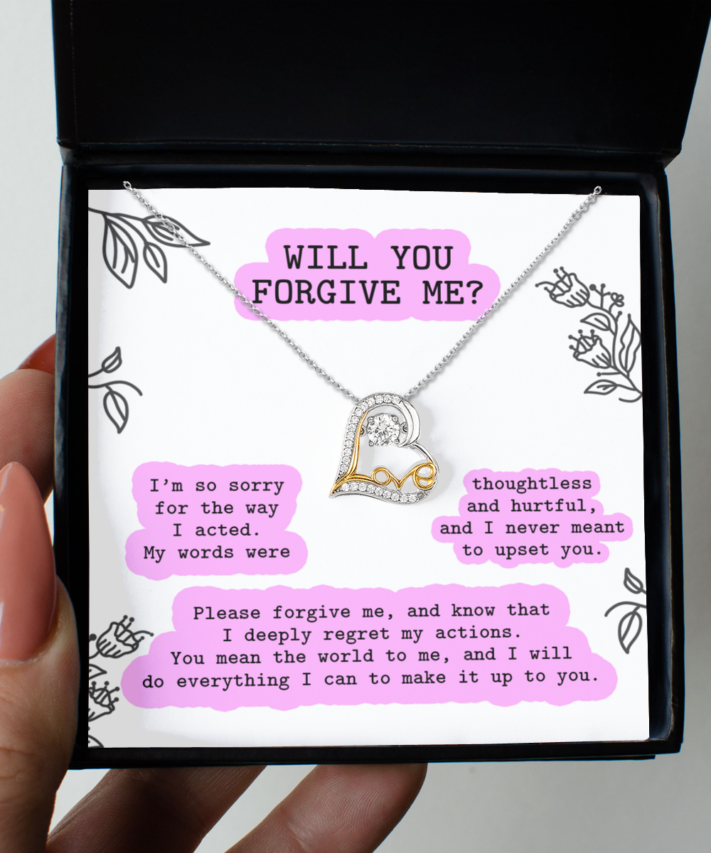 A heartfelt gesture in an open box: the Sorry-Never Meant To - Love Dancing Necklace, a hypoallergenic sterling silver piece, accompanied by an apology note that reads, "Will you forgive me?" and filled with expressions of regret and love.