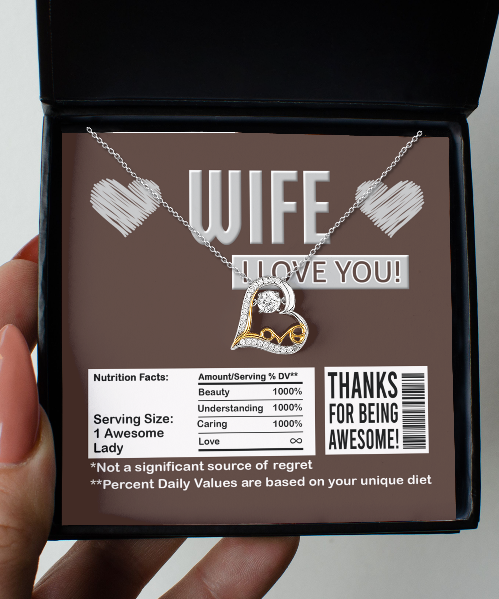 A To Wife, Nutrition Facts - Love Dancing Necklace with a heart-shaped, sterling silver pendant, and a note that reads "Wife, I love you!" comes complete with humorous nutritional facts about love and appreciation for a wife.