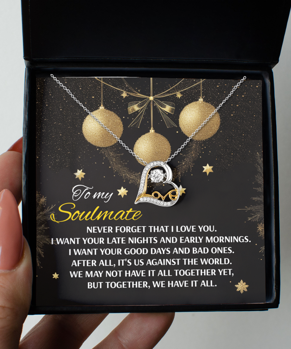 The Soulmate-Have It All- Love Dancing Necklace, crafted in sterling silver with a heart-shaped design, showcases a decorative background and conveys a message of love and unity to a soulmate.