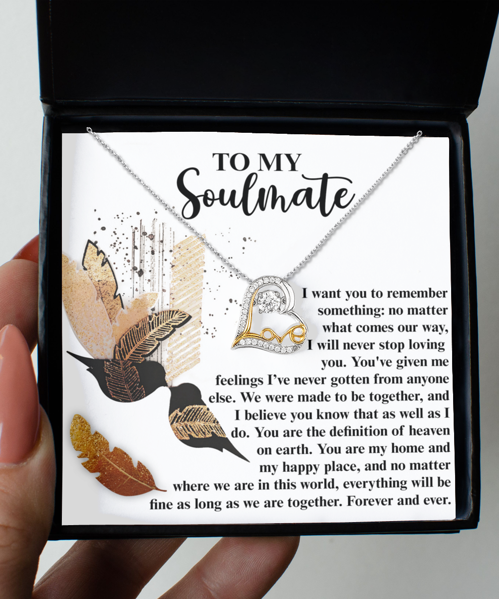 Introducing the Soulmate-Given Me Feelings - Love Dancing Necklace, a beautifully crafted sterling silver pendant necklace in the shape of a heart, presented in an elegant gift box. It features an inspiring message about love and commitment for your soulmate. The intricate design elements enhance its elegance, making it a perfect symbol of everlasting devotion.