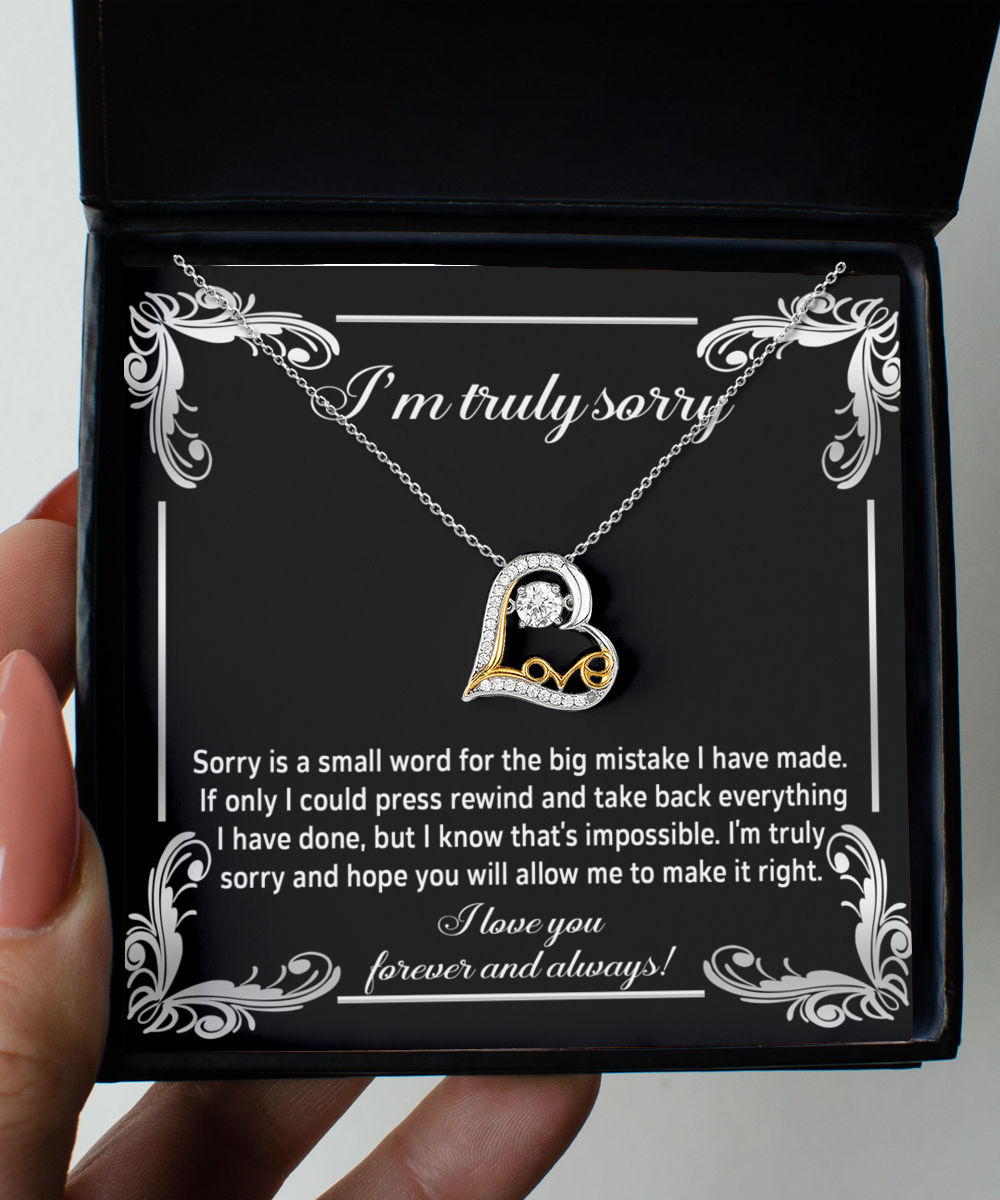 The Sorry-Make It Right - Love Dancing Necklace, featuring a heart-shaped pendant, is beautifully presented in a box with an apology message inscribed on the inside lid. The elegantly designed text complements the .925 Sterling Silver necklace, expressing deep regret for a significant mistake and hoping for forgiveness.