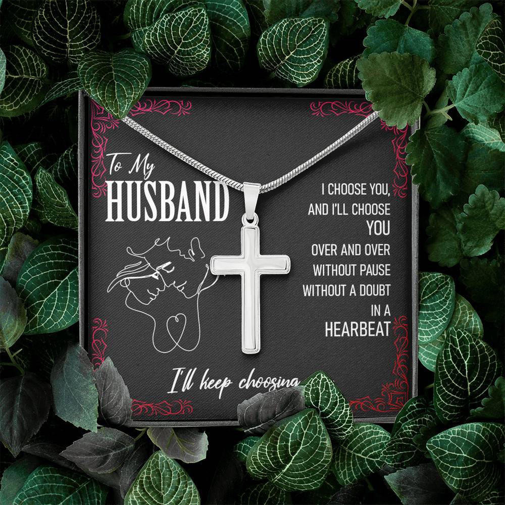 A slingly cross necklace with the words "To My Husband, I'll Keep Choosing You".