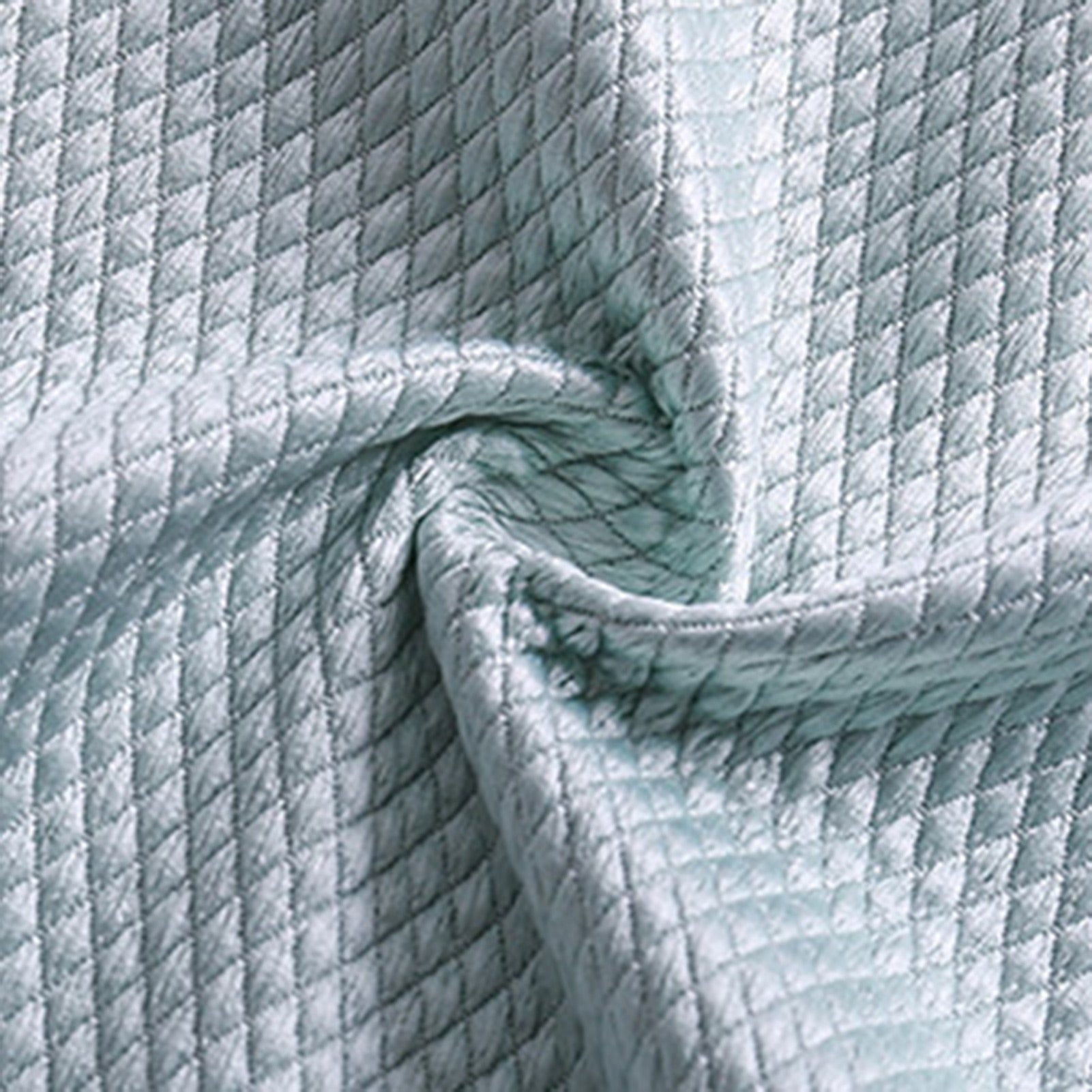 A close up image of a light blue quilted Fish Scale Nano Reusable Cleaning Cloths fabric by MezoJaoie Wonder Lifestyle Store.