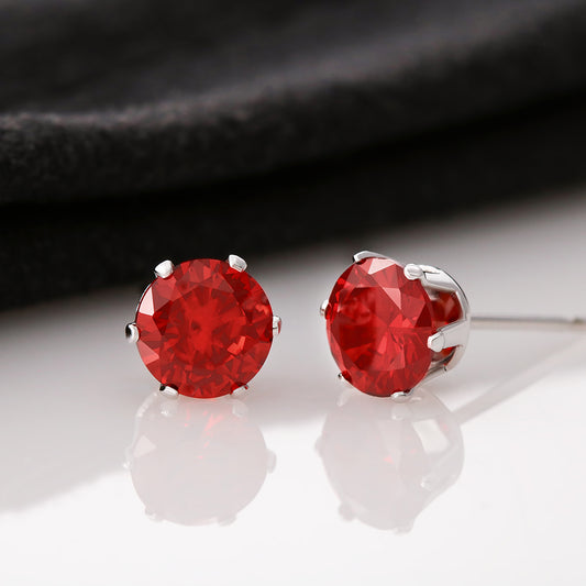 A pair of red Cubic Zirconia earrings from ShineOn Fulfillment on a black background.