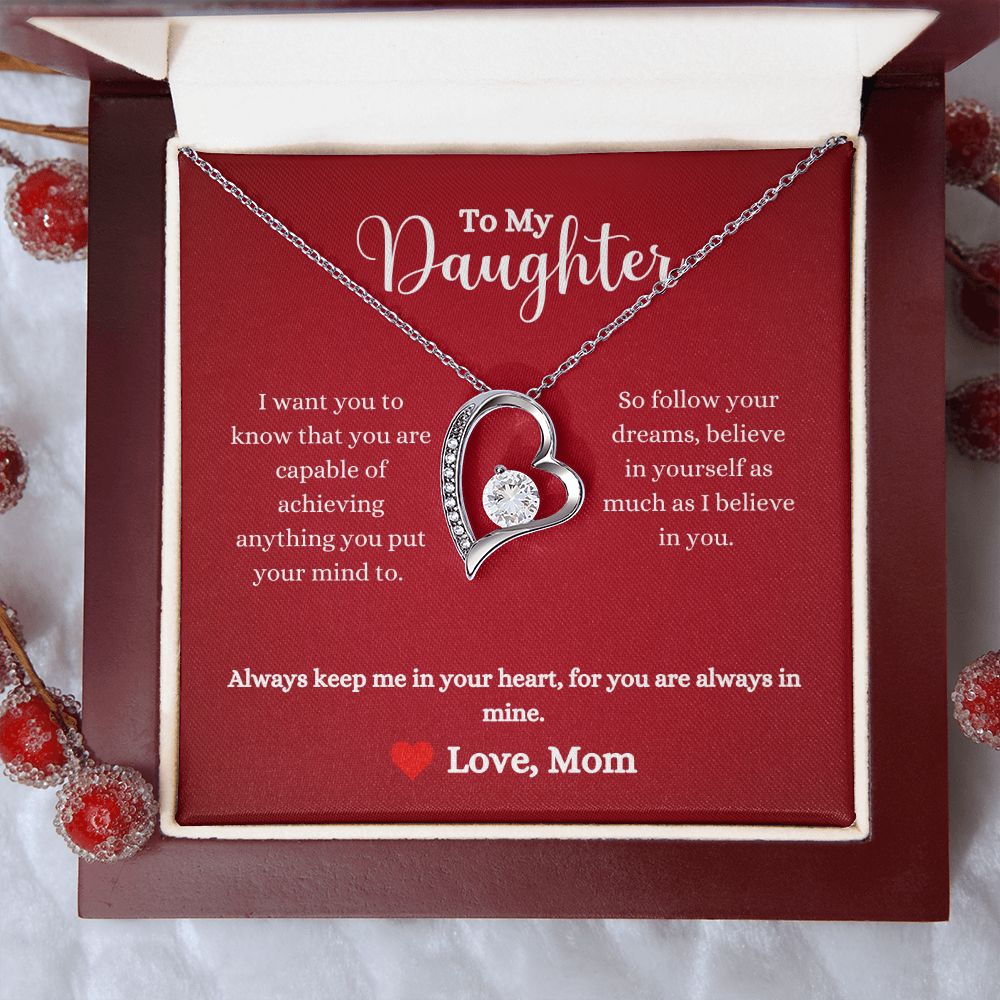 A ShineOn Fulfillment heart shaped necklace, the Always Keep Me In Your Heart Forever Love Necklace - Gift for Daughter from Mom, with a message to my daughter.