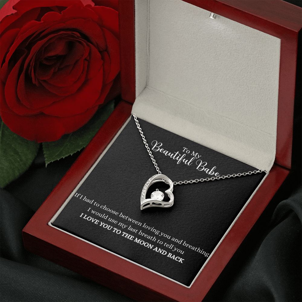 A Love you to the moon and back Forever Love Necklace - For Soulmate or Wife by ShineOn Fulfillment, with a red rose in a box.