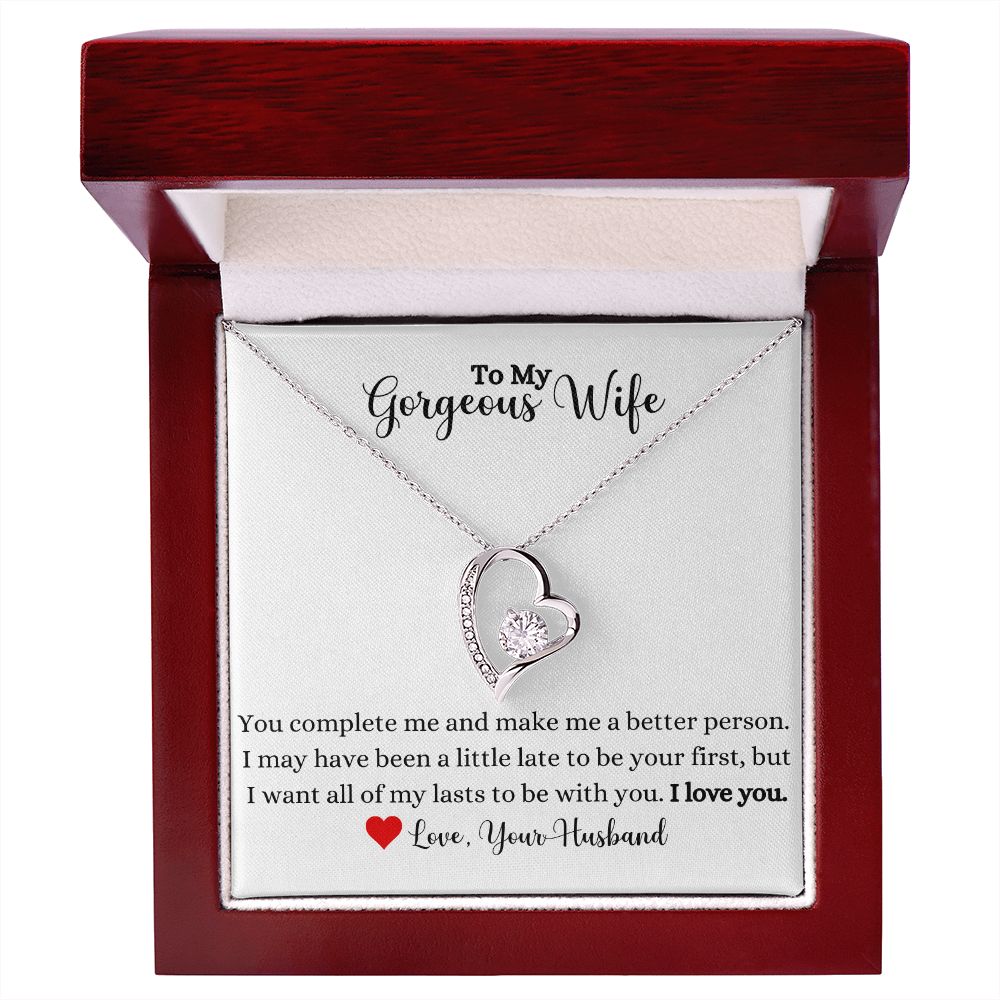 A gift box with a You Complete Me Forever Love Necklace - To Wife from Husband by ShineOn Fulfillment that reads, 'i love you'.