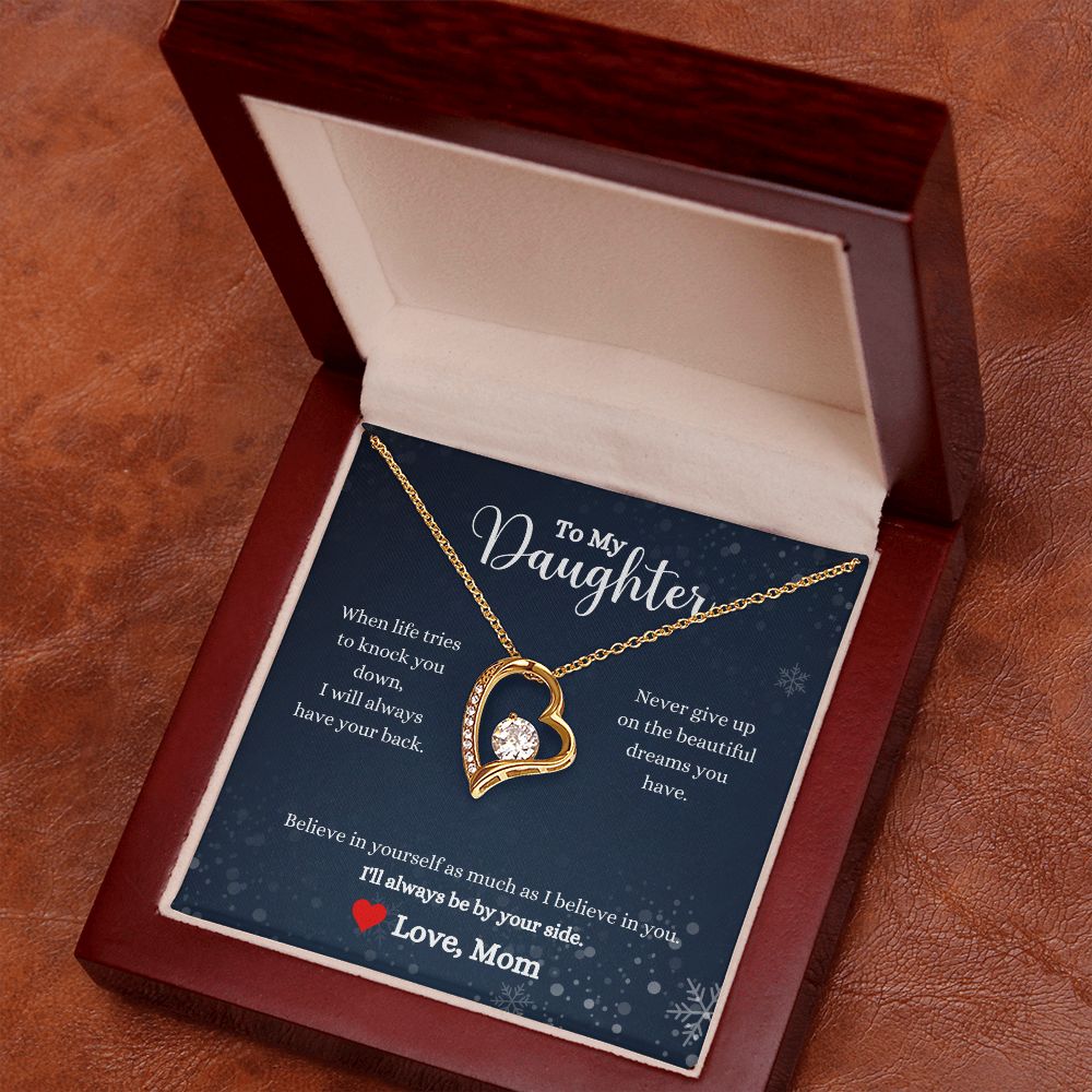 A "I'll Always Be By Your Side Forever Love Necklace - Gift for Daughter from Mom" heart shaped necklace in a wooden box by ShineOn Fulfillment.