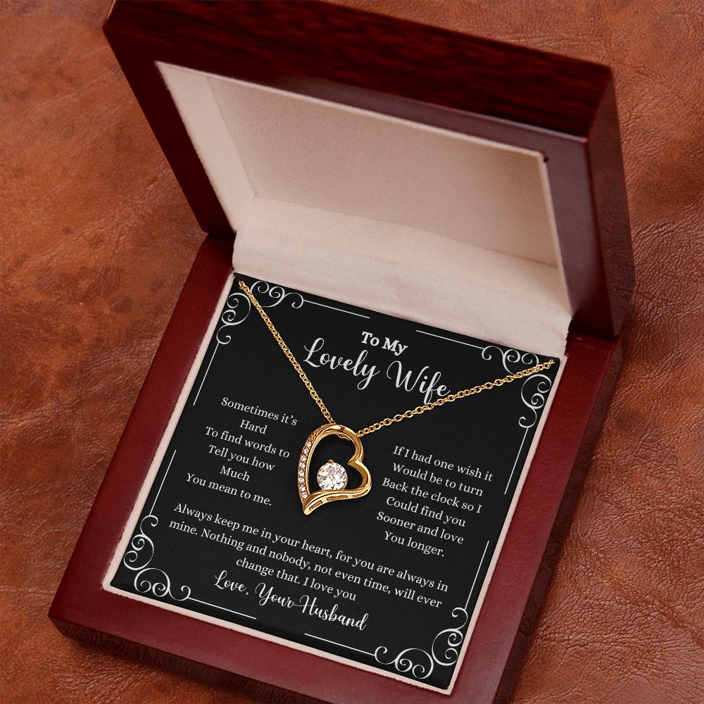 A black ShineOn Fulfillment box with the I Love You Forever Love Necklace - Gift for Wife from Husband in it.