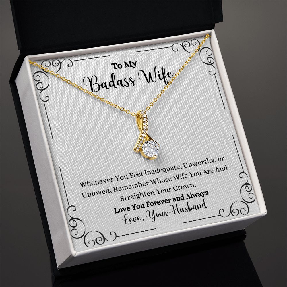 A gift box with the Remember Whose Wife You Are Alluring Beauty Necklace - Gift for Wife from Husband, made by ShineOn Fulfillment, that says to my badass wife.
