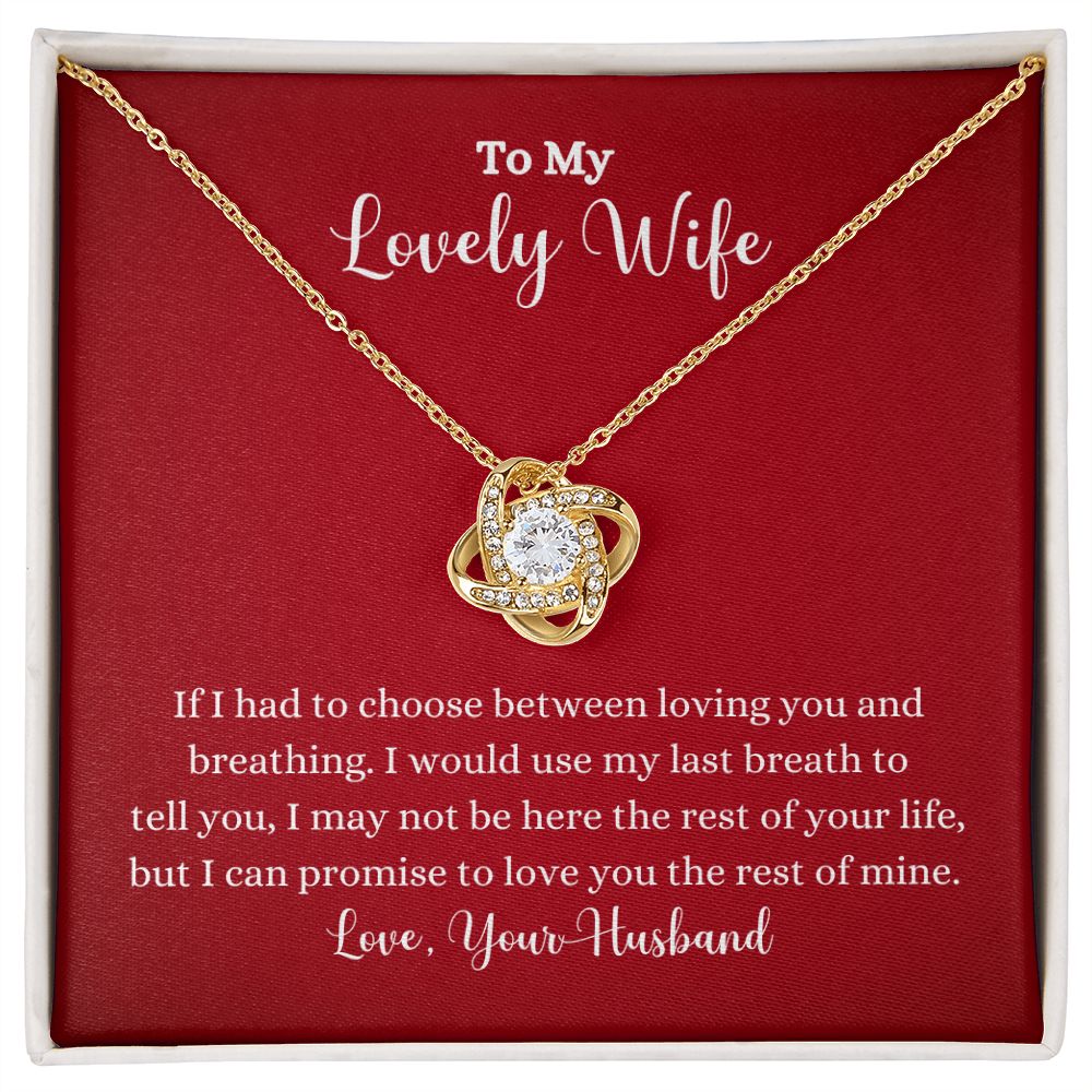 A red box with a Love You The Rest of Mine Love Knot Necklace - Gift for Wife from Husband, from the brand ShineOn Fulfillment, that says to my lovely wife.