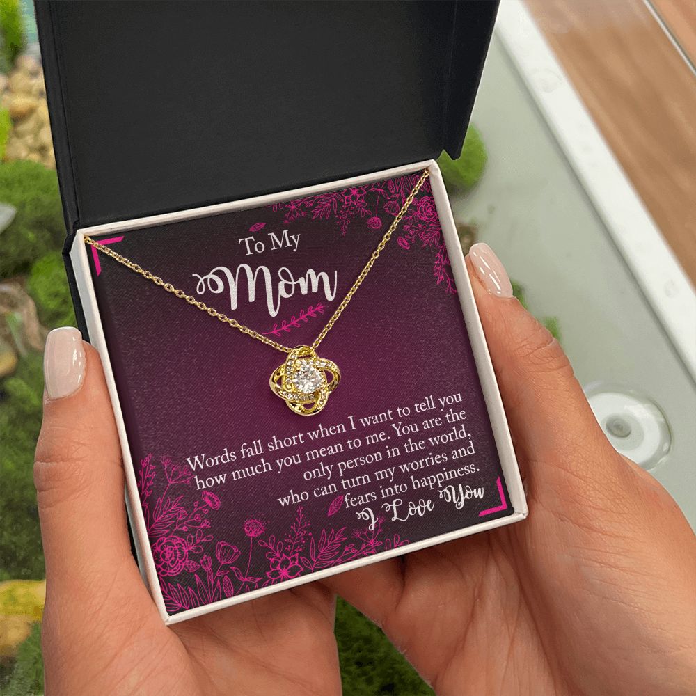 A person holding a gift box with a To My Mom - You Are The Only Person - Love Knot Necklace from ShineOn Fulfillment in it.