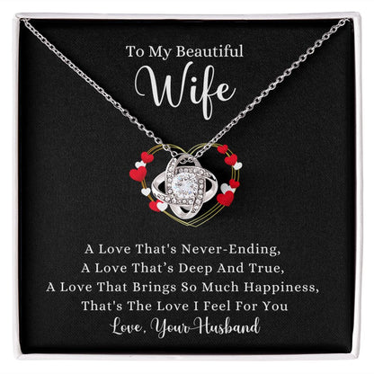 A box with a A Love That's Never-Ending Love Knot Necklace - For Wife by ShineOn Fulfillment that says to my beautiful wife.