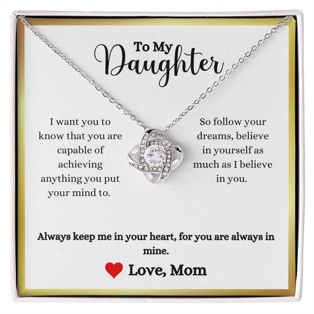 A box with the Always Keep Me In Your Heart Love Knot Necklace - Gift for Daughter from Mom by ShineOn Fulfillment.