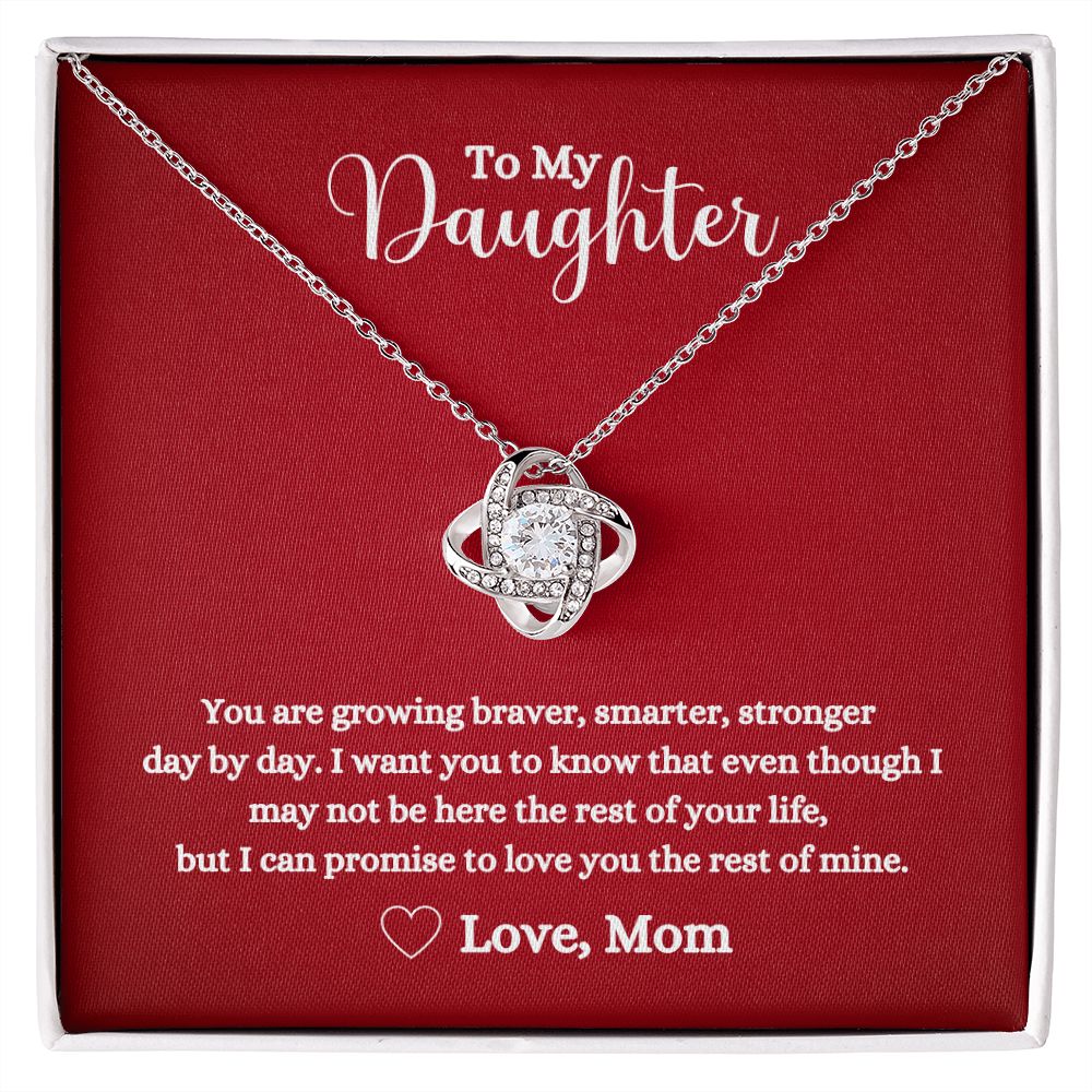 A red box with a "I can promise to love you for the rest of mine Love Knot Necklace - for Daughter from Mom" from ShineOn Fulfillment that says to my daughter.