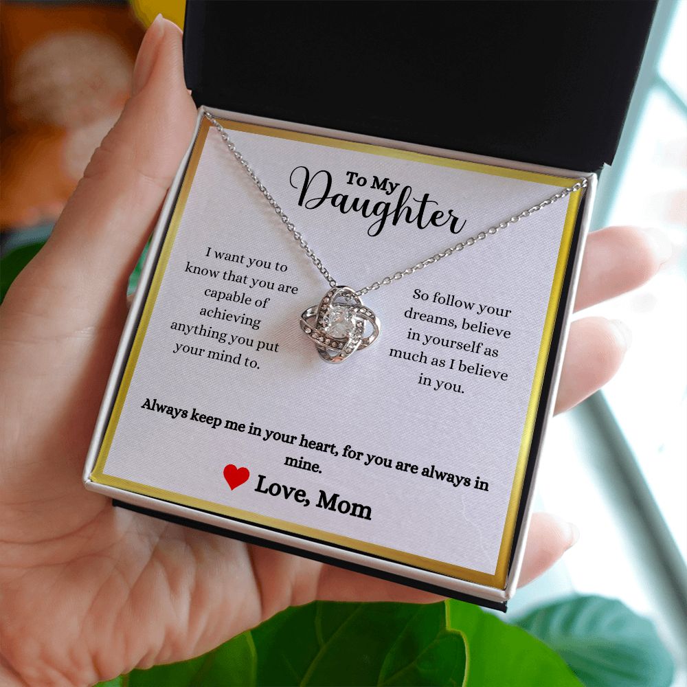 A ShineOn Fulfillment gift box with the Always Keep Me In Your Heart Love Knot Necklace - Gift for Daughter from Mom.