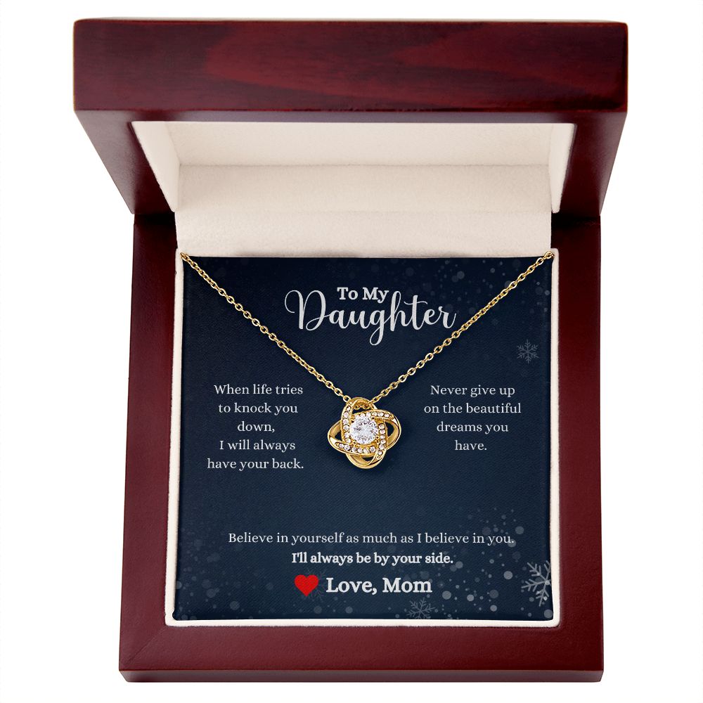 A gift box with an I Will Always By Your Side Love Knot Necklace from ShineOn Fulfillment that says "I love my daughter", featuring cubic zirconia crystals and an adjustable chain length.