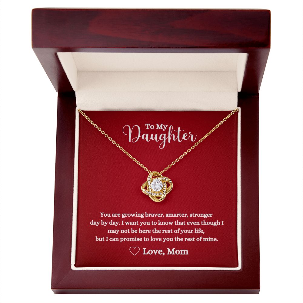A gift box with the Love Knot Necklace - for Daughter from Mom, made by ShineOn Fulfillment, that reads "I love you daughter.