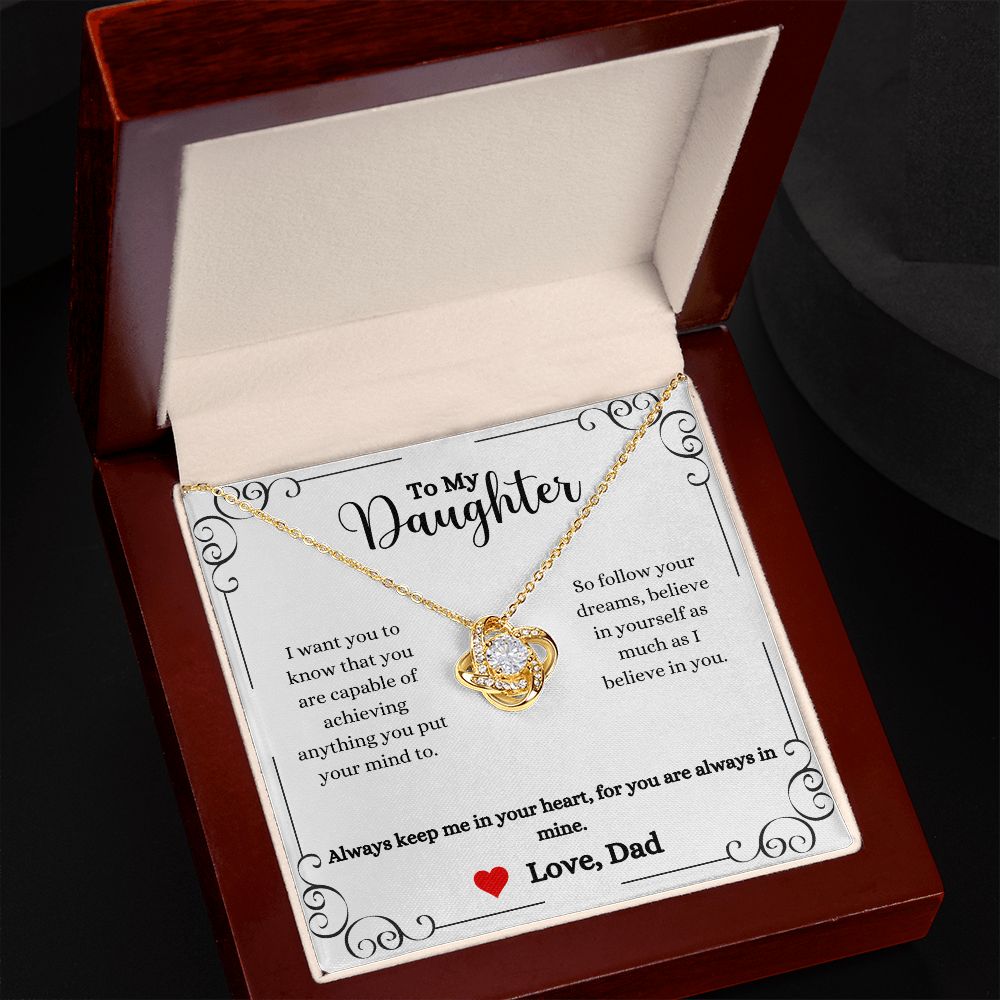 A gift box with the Always Keep Me In Your Heart Love Knot Necklace- Gift for Daughter from Dad by ShineOn Fulfillment in it that says, i love you daughter.