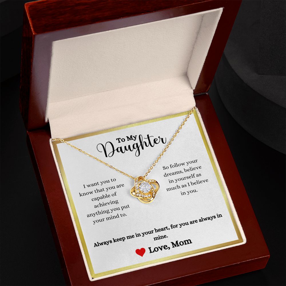 A ShineOn Fulfillment gift box with an Always Keep Me In Your Heart Love Knot Necklace - Gift for Daughter from Mom.