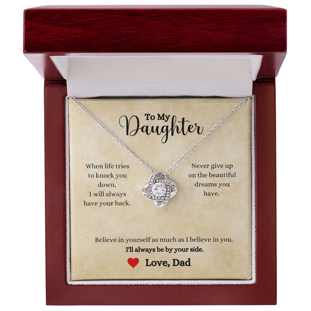 A ShineOn Fulfillment gift box with the I'll Always Be By Your Side Love Knot Necklace - Gift for Daughter from Dad that reads, i love you my daughter.