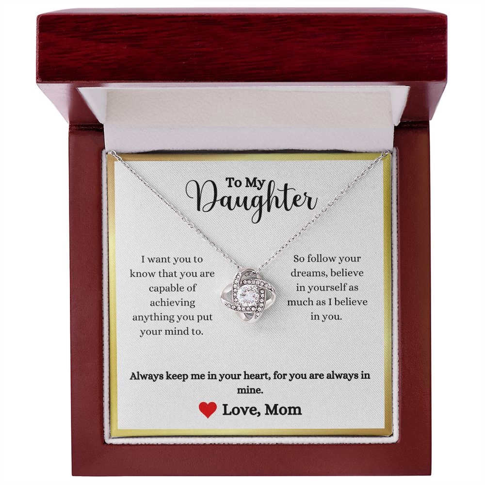 A gift box with the Always Keep Me In Your Heart Love Knot Necklace - Gift for Daughter from Mom by ShineOn Fulfillment that reads, i love you my daughter.