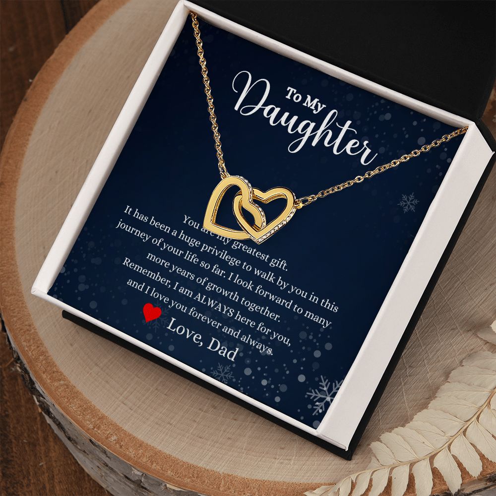 A gift box with the "You Are My Greatest Gift Interlocking Hearts necklace - Gift for Daughter from Dad" necklace by ShineOn Fulfillment and a gift card.