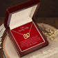 A gift box with the Love You The Rest of Mine Interlocking Hearts Necklace - Gift for Wife from Husband by ShineOn Fulfillment in it.