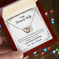 A gift box with a Remember Whose Wife You Are Interlocking Hearts Necklace - Gift for Wife from Husband by ShineOn Fulfillment in it.