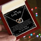 A gift box with the I Love You Interlocking Hearts Necklace from ShineOn Fulfillment in it.