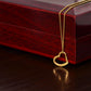 A I Wish You All The Abundance of Love - Delicate Heart Necklace For Daughter from ShineOn Fulfillment sits on top of a wooden box.