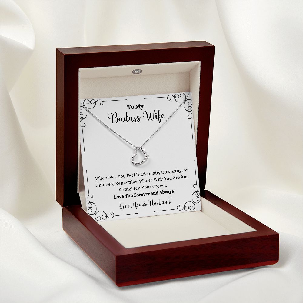 A wooden box with the Remember Whose Wife You Are Delicate Heart Necklace - Gift for Wife from Husband by ShineOn Fulfillment in it.