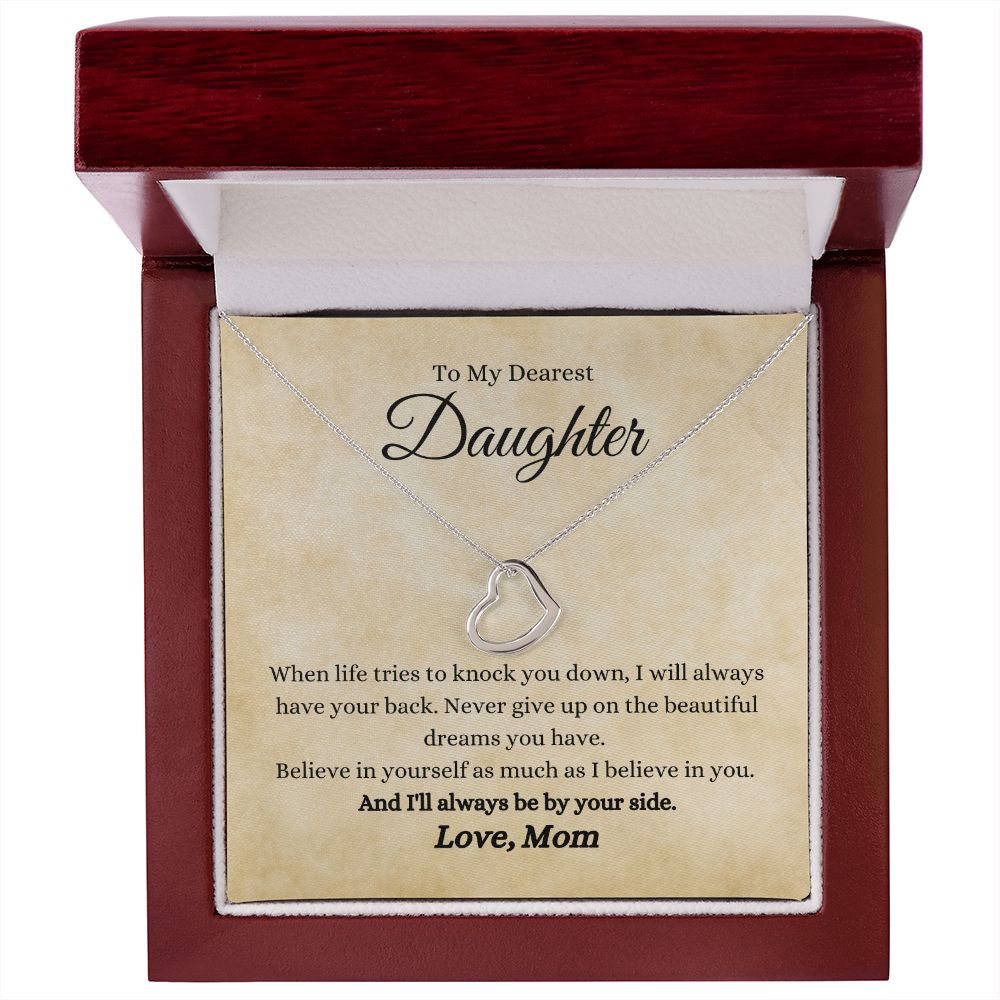 A gift box with the "I Will Always By Your Side Delicate Heart Necklace- Gift for Daughter from Mom" by ShineOn Fulfillment, that reads, "i love you daughter.