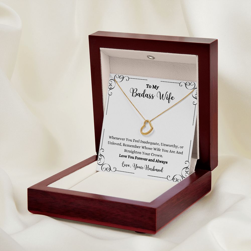 I'm a Remember Whose Wife You Are Delicate Heart Necklace in a wooden box.