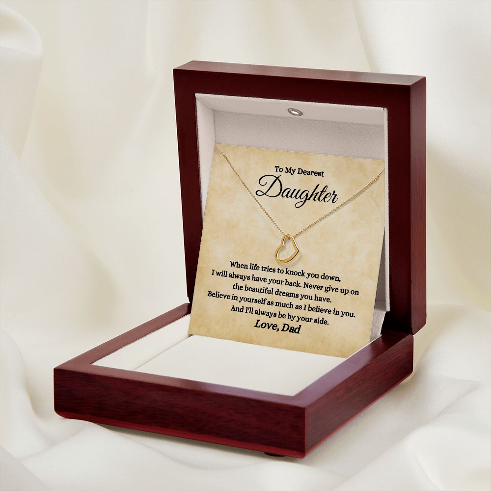 A wooden box with the "I will always be by your side Delicate Heart Necklace - For Daughter from Dad" necklace, from the ShineOn Fulfillment brand, in it.