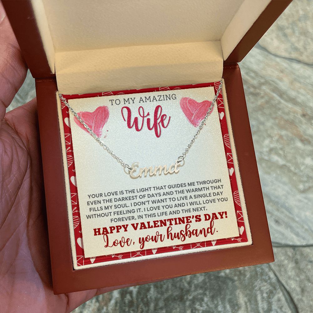 A Valentine's Day gift box with a "Your Love Is The Light Personalized Name Necklace - For Wife" by ShineOn Fulfillment.