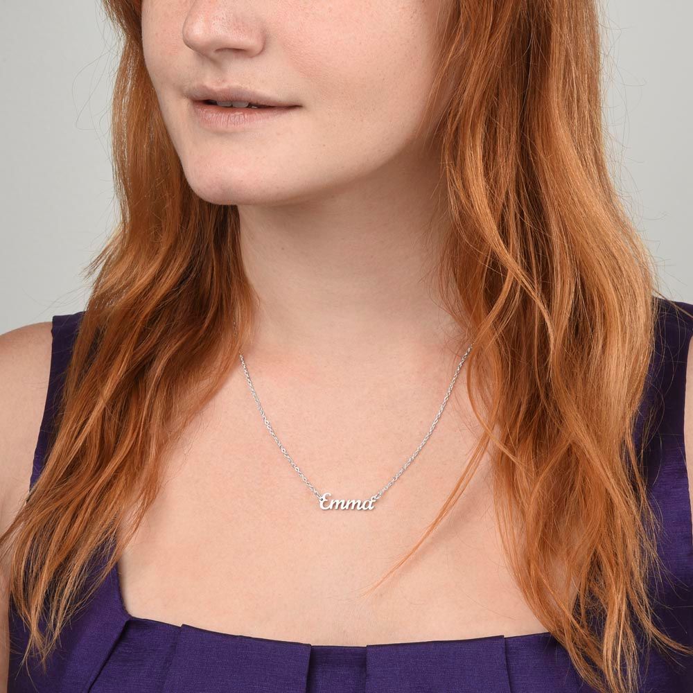 A woman with red hair wearing a ShineOn Fulfillment Personalized Custom Name Necklace with No Message Card.