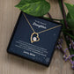 A ShineOn Fulfillment gift box with a Believe in Yourself Forever Love Necklace - Gift for Daughter from Mom and flowers.