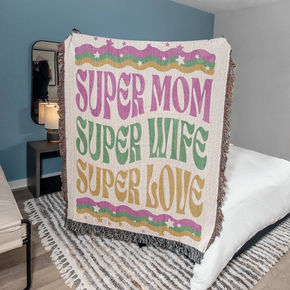 A bed with a Golden Value SG Super Mom Super Wife Super Love Heirloom Woven Blanket.