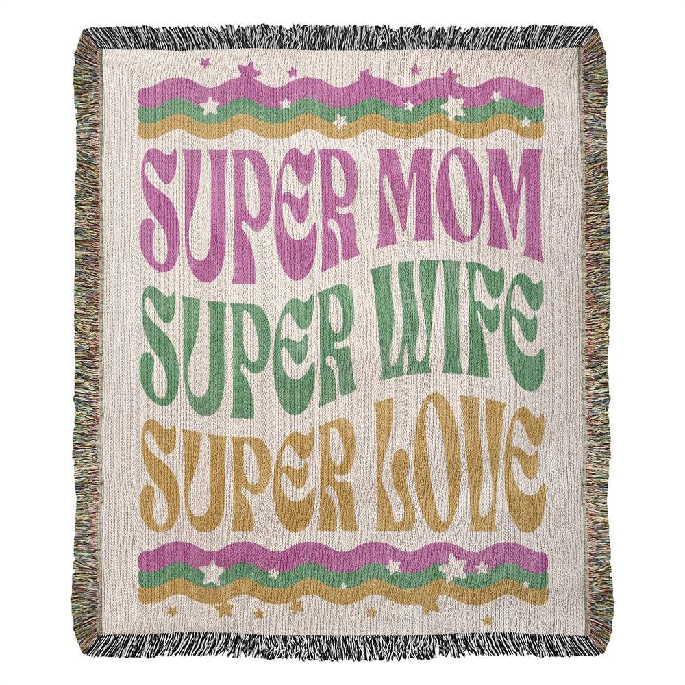 A white blanket with multicolored text, perfect for the Super Mom or Super Wife- Golden Value SG's Super Mom Super Wife Super Love Heirloom Woven Blanket.