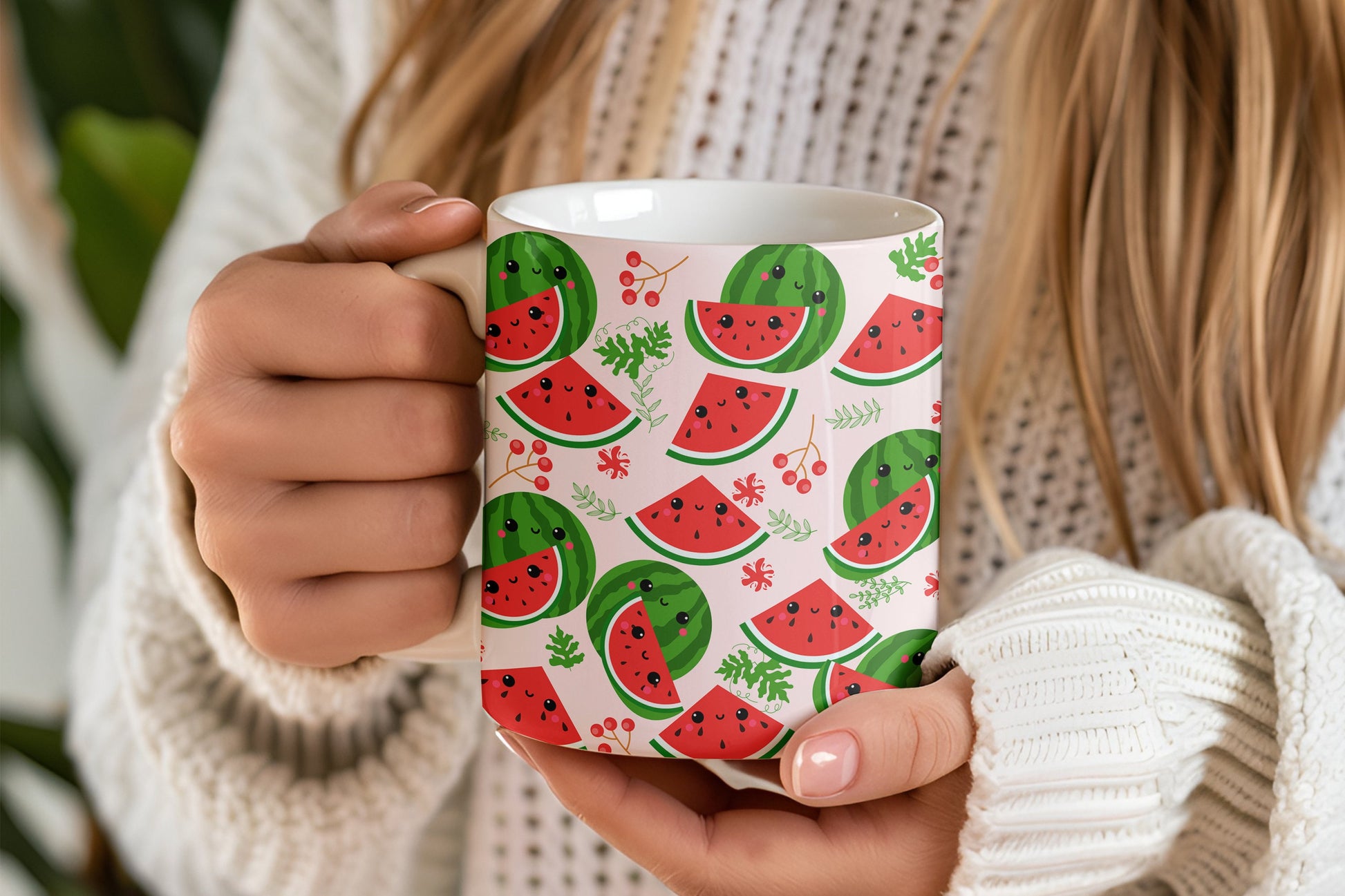 Woman holding a Gearbubble mug with a Cute Watermelon Print on Pink Background, received as a gift.