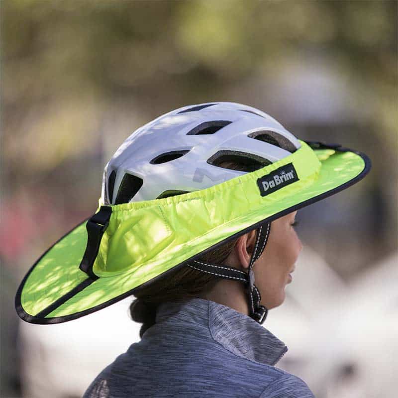 A young lady wearing Fluorescent Yellow Da Brim Sporty Cycling.