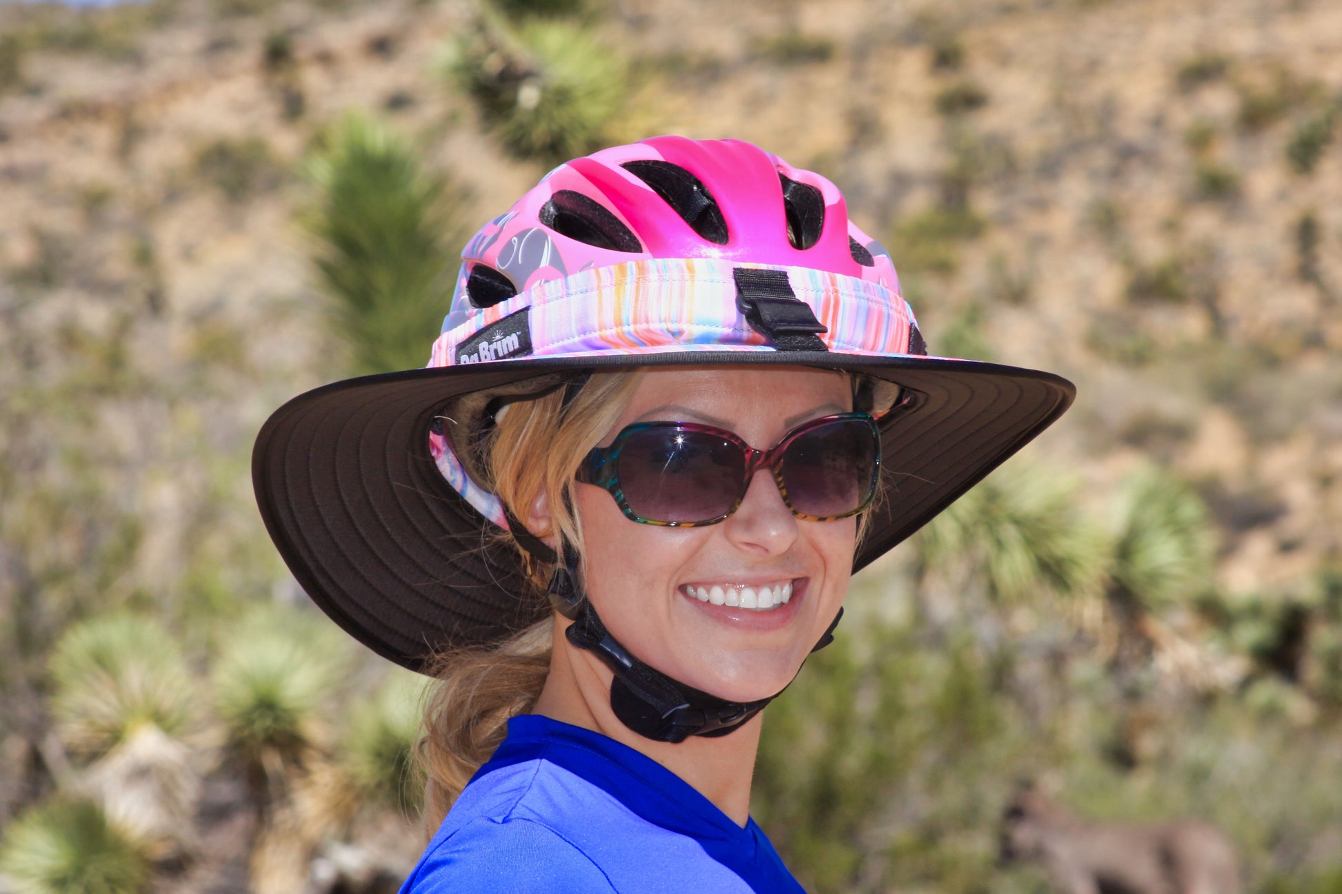 A young lady wearing Pastel Ribbons Da Brim Sporty Cycling.