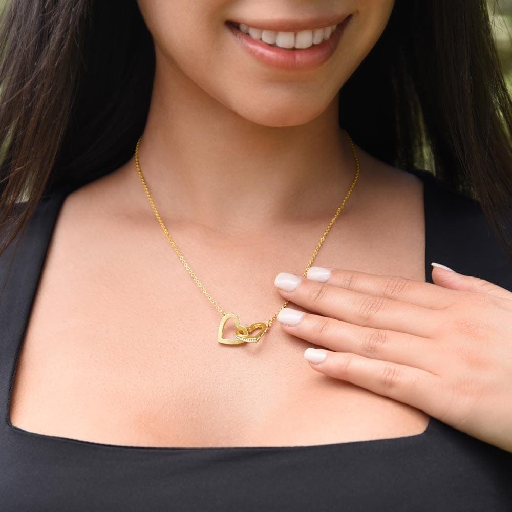 A woman wearing the I Love You Forever And Always Interlocking Hearts Necklace - Gift for Daughter from Dad by ShineOn Fulfillment.